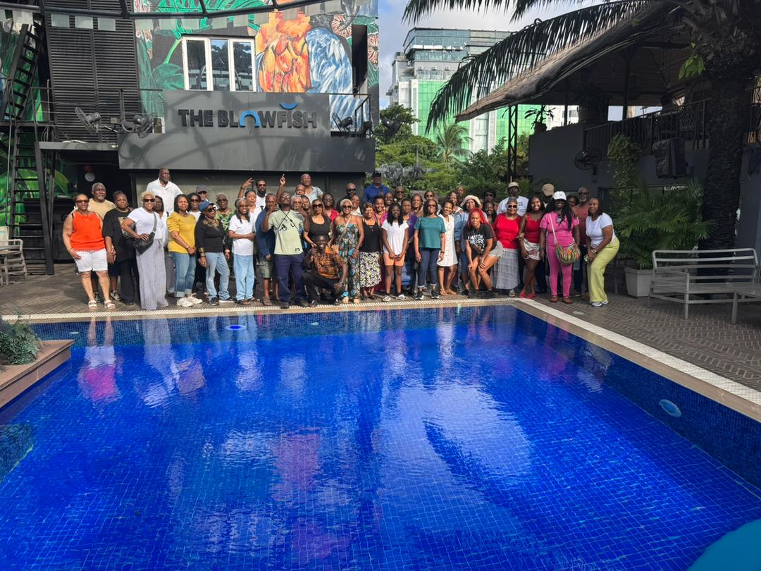 Visitors gathered with Benjamin during the final Lagos group tour picture