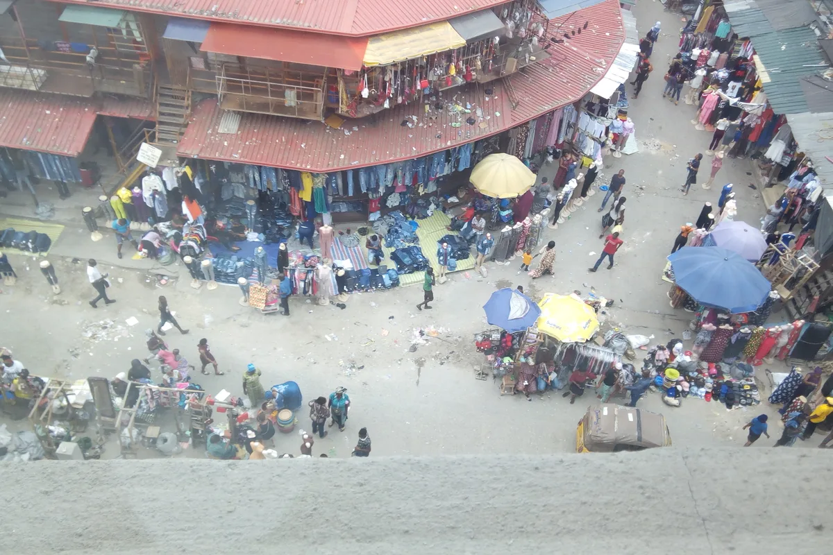 Crowded street activity at Balogun Market on Lagos Island